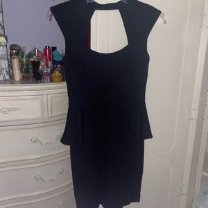 Classic black Bebe peplum dress